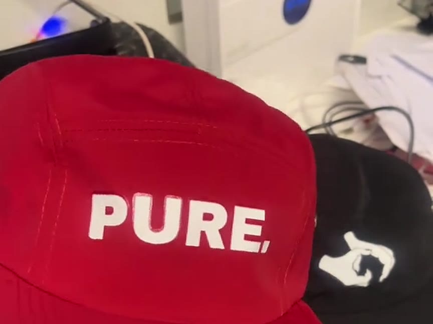 DTF printed caps for Gesture Culture and PURE.
